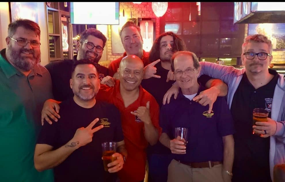 Marine Corps League Detachment 1490 members gathering together at a local social event